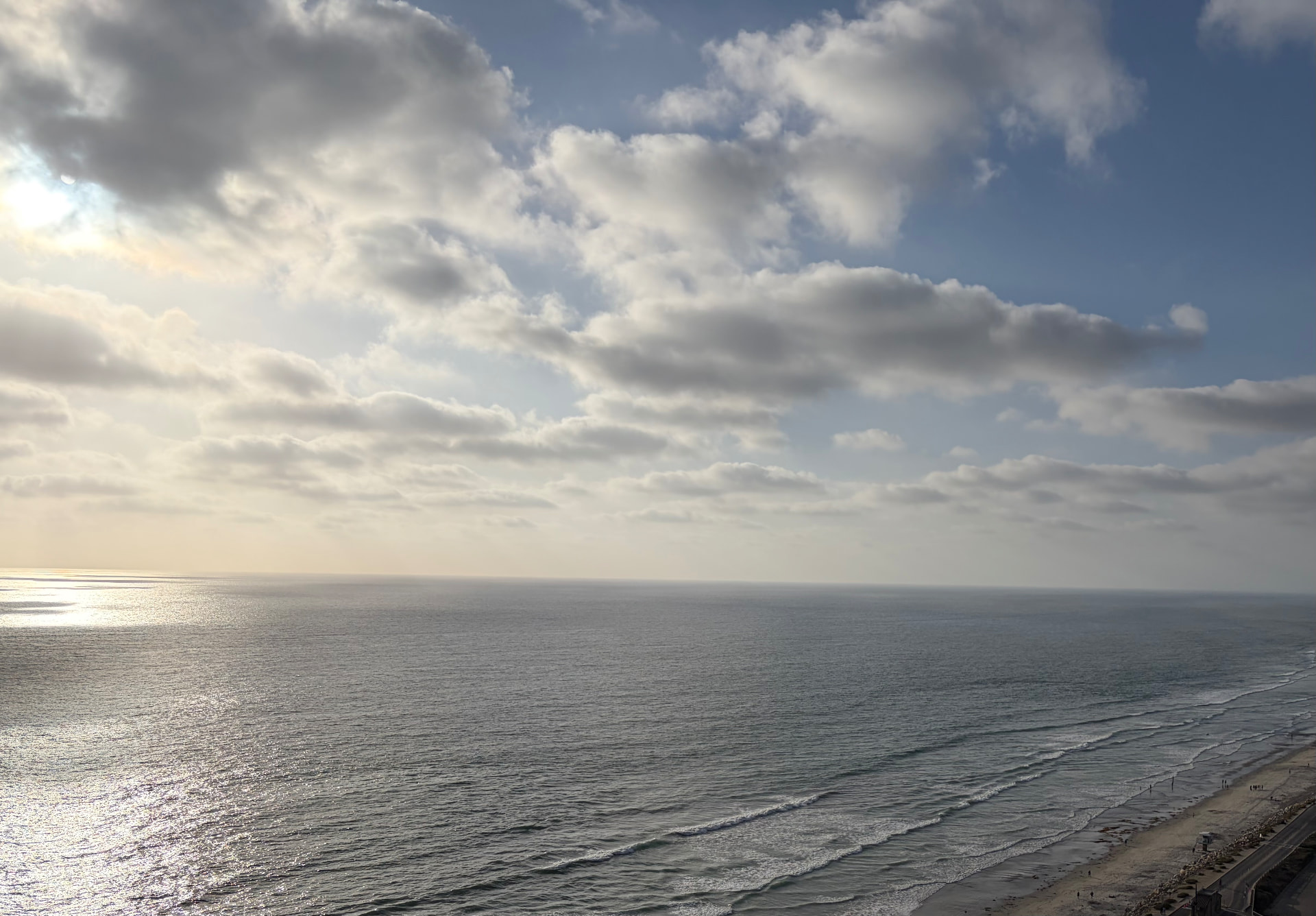 Sunlit ocean stretching to the horizon